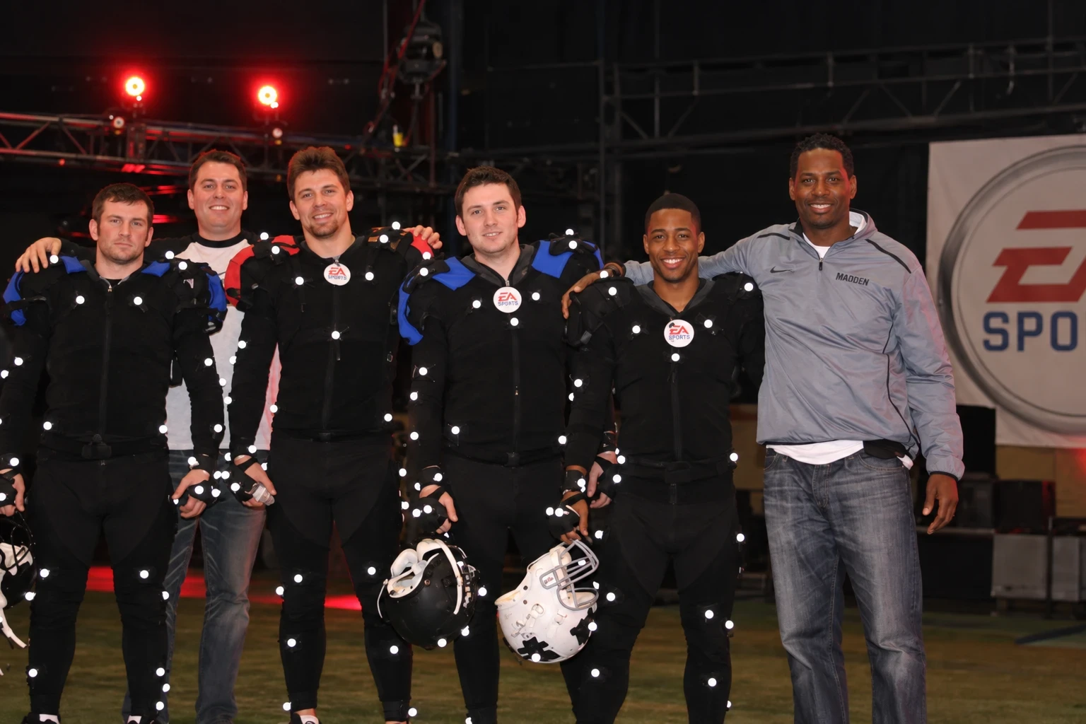 Sean Diehl with fellow motion capture performers and colleagues in mocap suits at an EA Sports Madden shoot